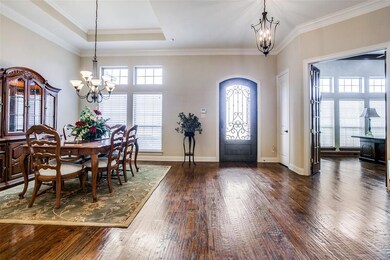 Hand scraped hardwood floors are just one of the exceptional things about this home.