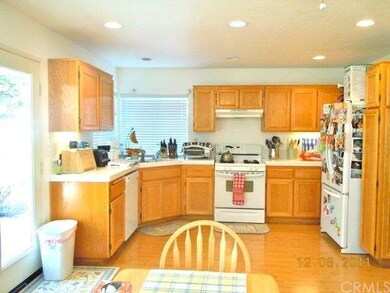Large kitchen with recessed lighting