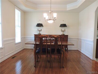 Formal dining room, chair, picture frame molding a