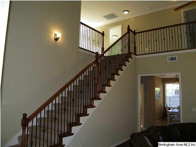 This 2 story great room is open and spacious.