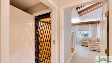 2 stop elevator just off kitchen and living room.