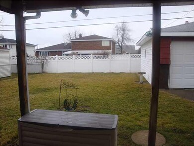 Exterior Back. Fully fenced backyard for privacy, 