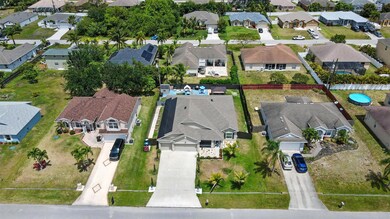 1041 SW Dartmouth Ave, Port St. Lucie, FL 34953 - photo 3