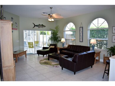 Open Great room with tile floors and oversized win