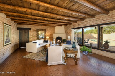 Living Room w/ Firplace and Brick Floor