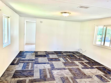 Empty room with baseboards