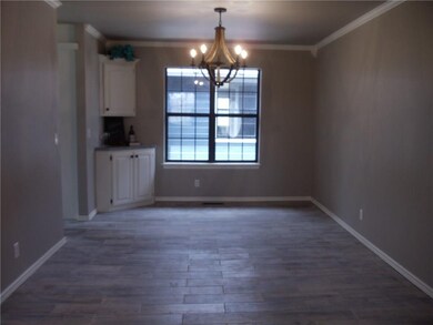 Dining room has new tile floors that look like woo