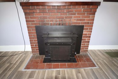 Brick fireplace with insert