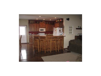 Kitchen opens to great room.  Wood floors from ent