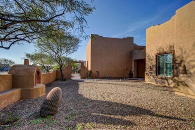 Exterior Front Courtyard Fireplace