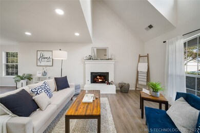 Living Room with Beautiful Brick Fireplace.