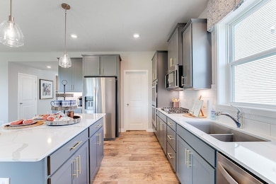 Lots of cabinet and storage space for all your needs. Model picture shown.