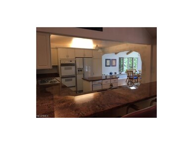 Another view of the kitchen - bar height counter a