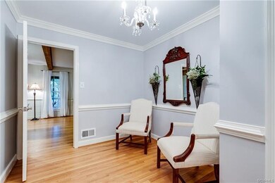 Generous foyer space could easily accommodate an e