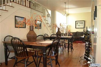 Dining Room with Mirrored Wall