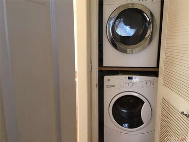 Laundry closet with space saving stackable high ef