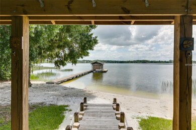 With a boat house on spring-fed  Lake Joanna for y