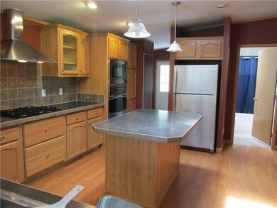 Kitchen view showing the Driveway...