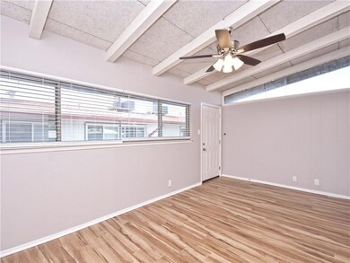 Unfurnished room featuring baseboards, a ceiling 