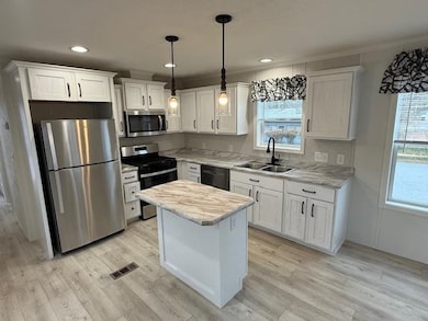 10 Courtesy Ave, Belmont, NH 03220 - photo 4