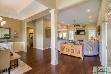 Gorgeous hardwoods, tray ceiling and chair rail ac