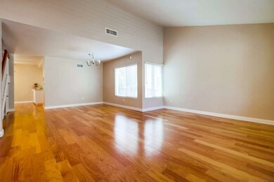 Living/dining room combo has amazing natural light