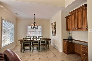 Separate Breakfast Room with lots of windows and n