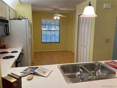 View toward Eat In Kitchen area from Breakfast Bar