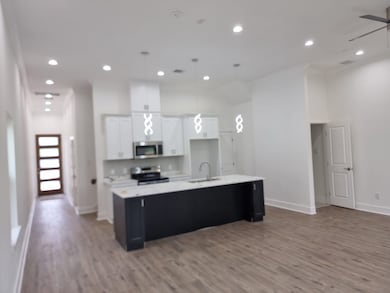 This spacious, modern kitchen features an open lay
