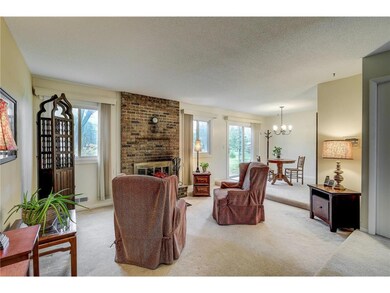 Lovely main floor family room with wood burning fi