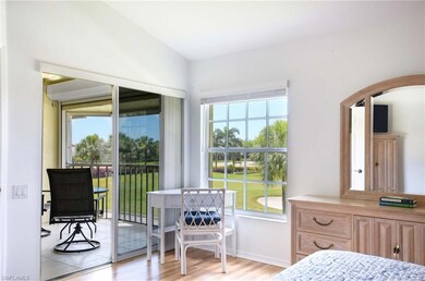 Bedroom with arched walkways, multiple windows, li