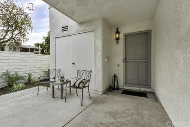 WELCOMING FRONT PATIO WITH EXTRA STORAGE