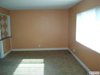 Living room opens to dining.