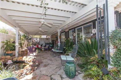 The 800 square foot rain-proof patio and arbor pro