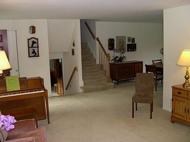 Living Room. Looking back toward dining room on ri