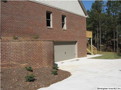 Yes it has an unfinished basement and 4 garages!