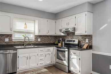 Stainless Steel Appliances and new tile backsplash