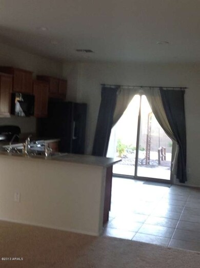 LOOKING INTO KITCHEN