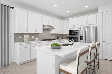 Gorgeous, kitchen layout with quartz countertops,