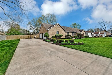 with an amazing three car garage,