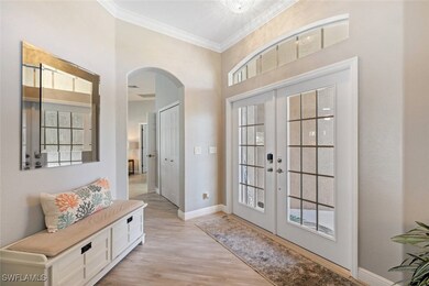 Doorway to outside featuring french doors, light w