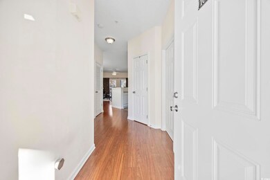 Hallway featuring wood-type flooring