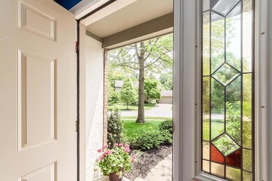 Front door - leaded glass side lights.