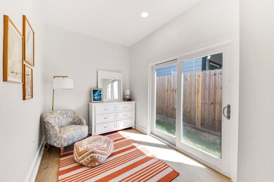 The first-floor secondary bedroom offers a comfort