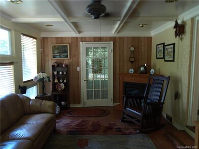 A second view of the sunroom reveals the custom bu