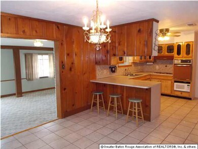 DINING LOOKING INTO KITCHEN