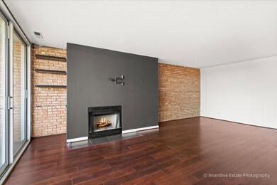 A Spacious Living Area With a Gas Fireplace
