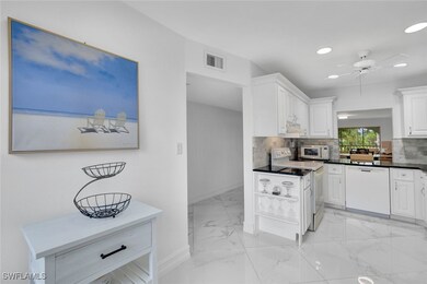 1055 Forest Lakes Dr unit F203, Naples, FL 34105 - photo 6