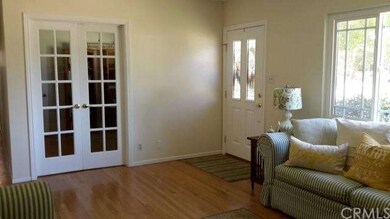 FORMAL LIVING ROOM-DOORS TO OFFICE/DEN