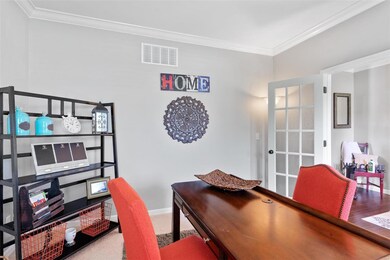 French door and crown molding great features.